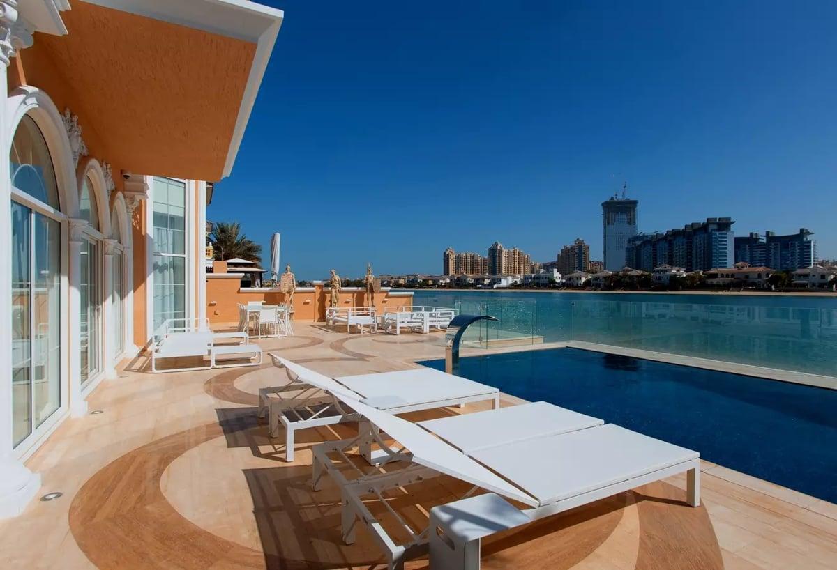 Вилла на продажу  в  Garden Homes Frond недвижимость в ОАЭ - Luxury 5 Bedroom Villa for sale in Garden Homes Palm Jumeirah property in Dubai real estate in dubai